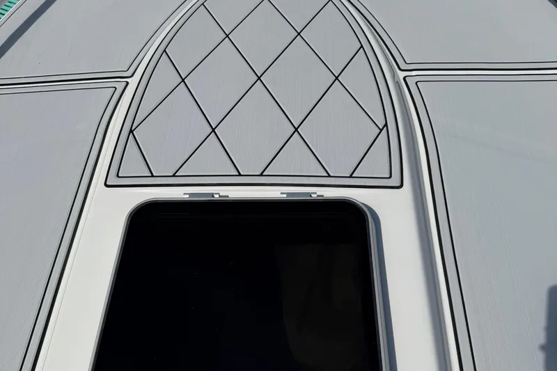  Yacht Photos Pics 2005 Marlago 35 boat deck with diamond pattern design.