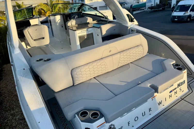  Yacht Photos Pics 2026 Four Winns H33 OB boat interior with luxurious seating and modern design.