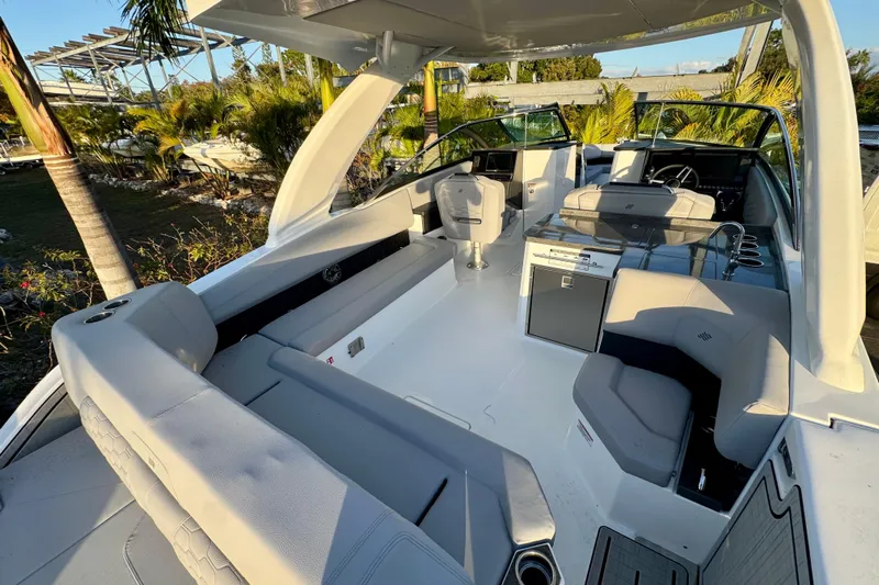  Yacht Photos Pics Luxurious 2026 Four Winns H33 OB boat interior with spacious seating and modern design.