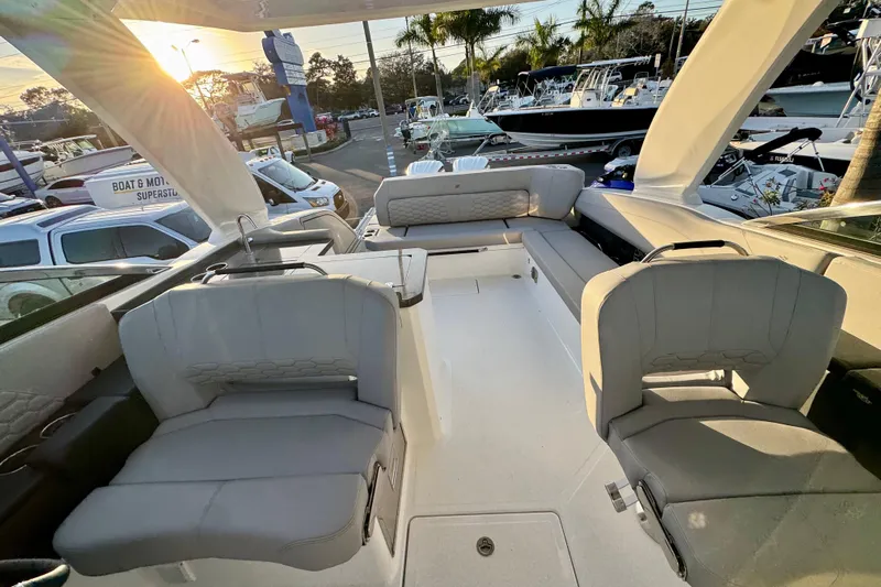  Yacht Photos Pics 2026 Four Winns H33 OB boat interior with luxurious seating and modern design.