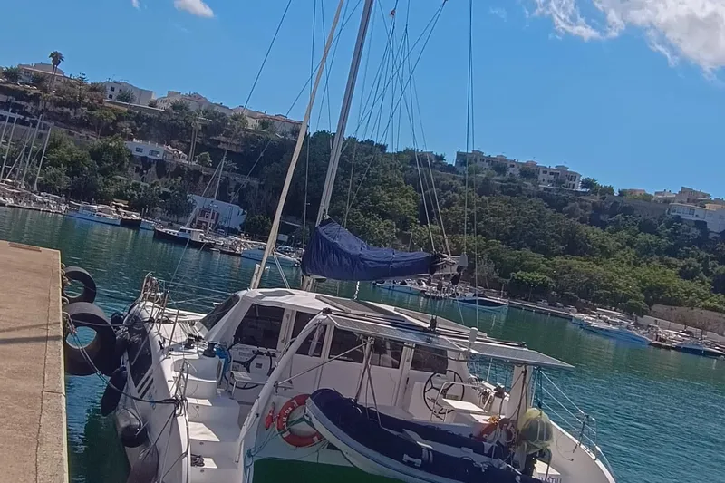 Seis Al Mar Yacht Photos Pics Seawind 1260 catamaran docked in a scenic marina, 2018 model.