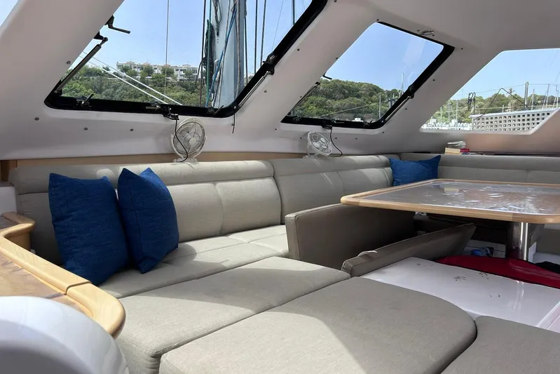 Seis Al Mar Yacht Photos Pics Interior of 2018 Seawind 1260 catamaran with comfortable seating and large windows.