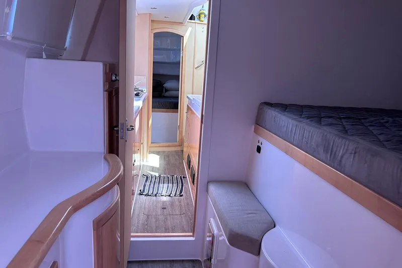 Seis Al Mar Yacht Photos Pics Interior of 2018 Seawind 1260 catamaran, featuring cozy cabin and modern amenities.