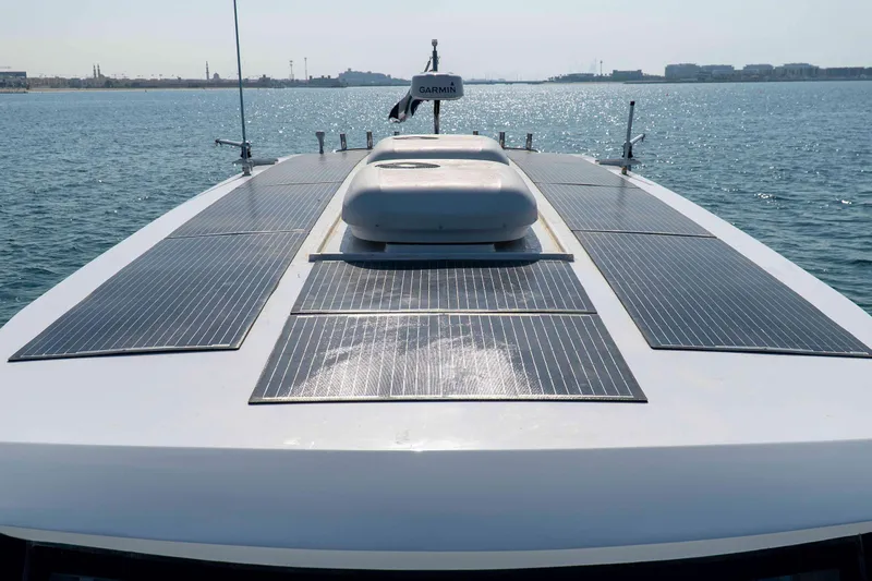  Yacht Photos Pics SilverCAT 40LUX 2026 yacht with solar panels on deck, cruising on calm waters.