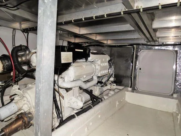 Orca Belle Yacht Photos Pics Engine room of 2000 Navigator 5300 yacht, showcasing machinery and components.