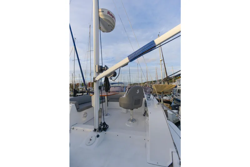 Sante Yacht Photos Pics 2013 Beneteau Swift Trawler 34 Fly deck view with seating and equipment.