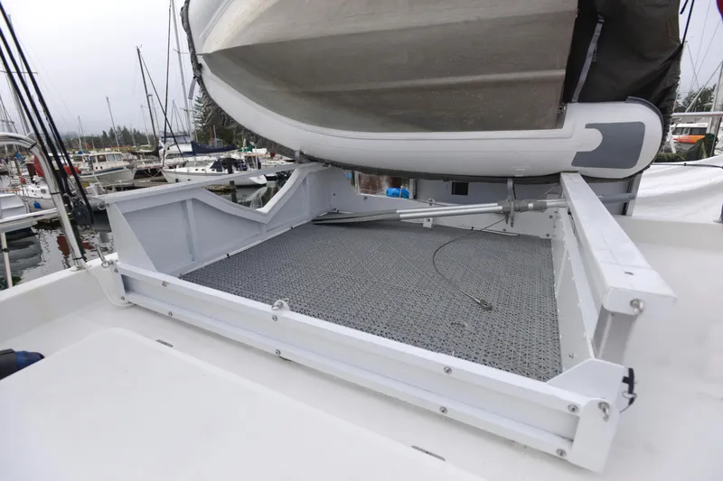 Sante Yacht Photos Pics 2013 Beneteau Swift Trawler 34 Fly deck with dinghy storage area.