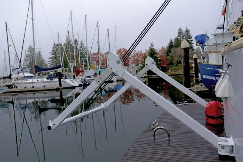 Sante Yacht Photos Pics Docked 2013 Beneteau Swift Trawler 34 Fly with davit system, surrounded by sailboats.