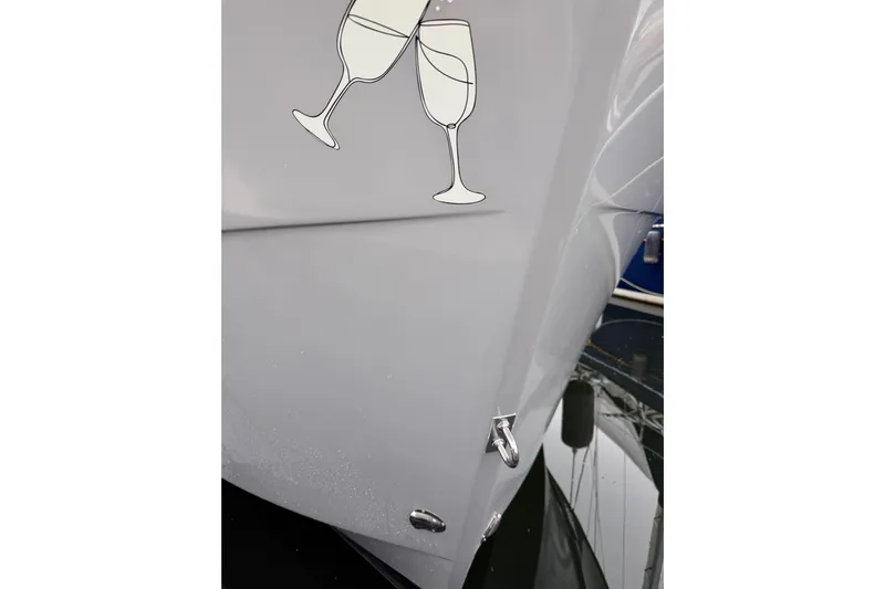 Sante Yacht Photos Pics 2013 Beneteau Swift Trawler 34 Fly with champagne glass decal on hull.
