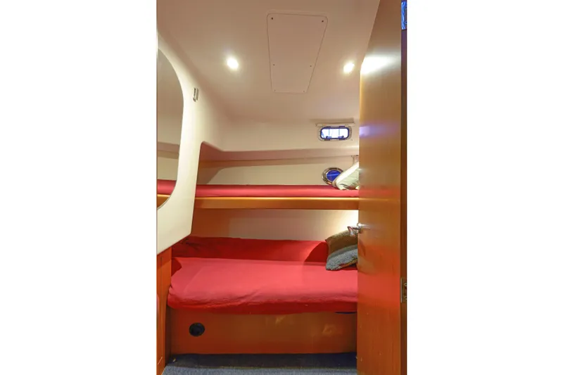 Sante Yacht Photos Pics Interior of 2013 Beneteau Swift Trawler 34 Fly with cozy bunk beds.