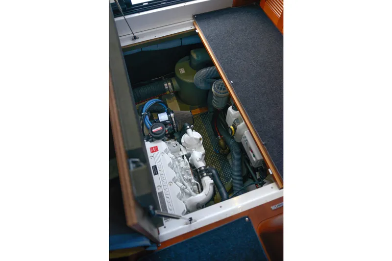 Sante Yacht Photos Pics Engine compartment of 2013 Beneteau Swift Trawler 34 Fly, showcasing mechanical components.