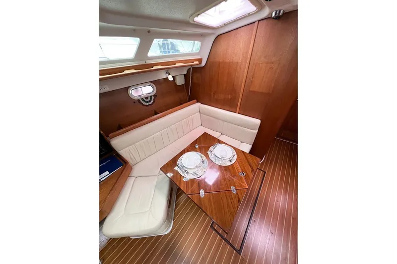 Just Cause Yacht Photos Pics Close up port side of dining area and wooden finishes.