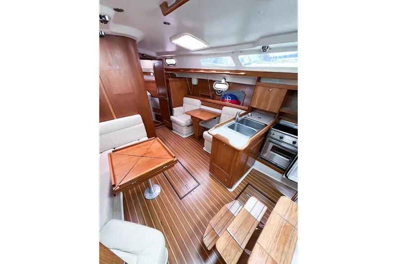 Just Cause Yacht Photos Pics Salon looking forward at starboard lounge chairs and galley