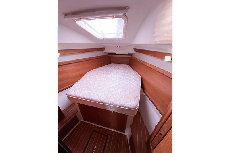 Just Cause Yacht Photos Pics Master cabin and berth forward with access from both sides and traditional mattress.