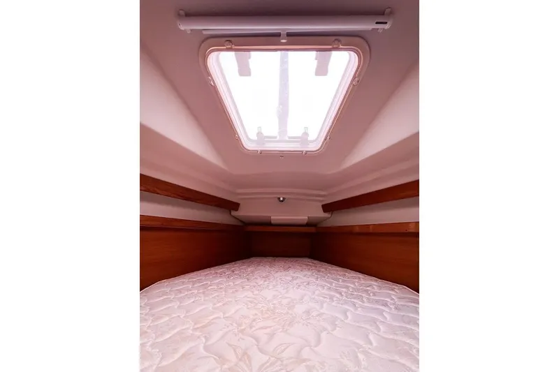 Just Cause Yacht Photos Pics Master cabin interior with overhead hatch and comfortable bedding.