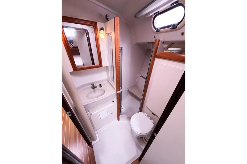 Just Cause Yacht Photos Pics Head area with with sink, toilet, mirror and shower