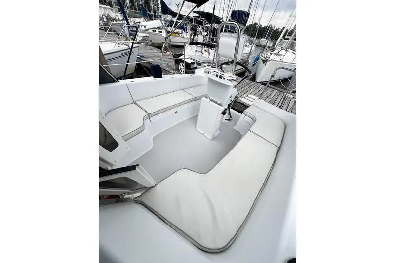 Just Cause Yacht Photos Pics Large cockpit with cushions. Easy access to aft platform around folded Lewmar wheel
