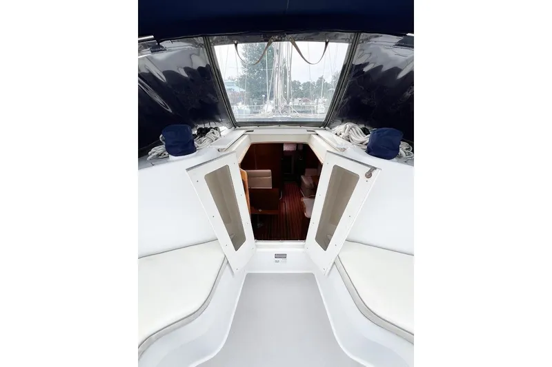 Just Cause Yacht Photos Pics Cockpit forward area showing line control stoppers, Haarken winches and cabin doors that allow for natural lighting