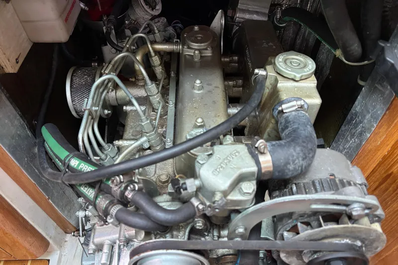 Just Cause Yacht Photos Pics Engine compartment of a 2007 Catalina 350 MkII sailboat, showing detailed mechanical components.