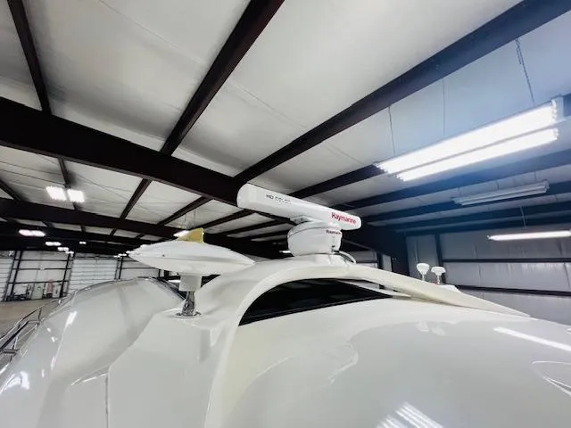  Yacht Photos Pics 2016 Sea Ray 470 Sundancer radar equipment in a warehouse setting.