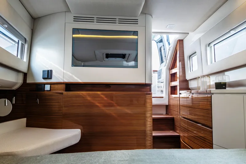  Yacht Photos Pics Luxurious interior of 2026 Wiszniewski Yachts W43, featuring elegant wood finishes and modern design.
