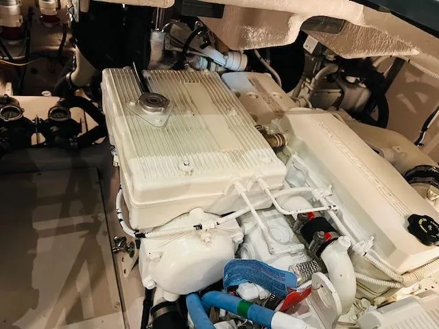  Yacht Photos Pics Engine compartment of 2016 Sea Ray 470 Sundancer boat, showcasing mechanical components.