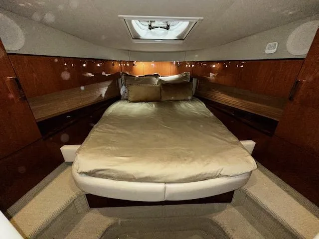  Yacht Photos Pics Luxurious cabin interior of 2016 Sea Ray 470 Sundancer yacht with cozy bed.