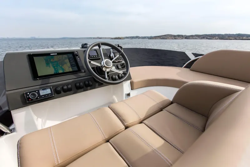 Seahawk Yacht Photos Pics Flybridge of 2017 Nimbus 405, featuring a modern helm and comfortable seating.