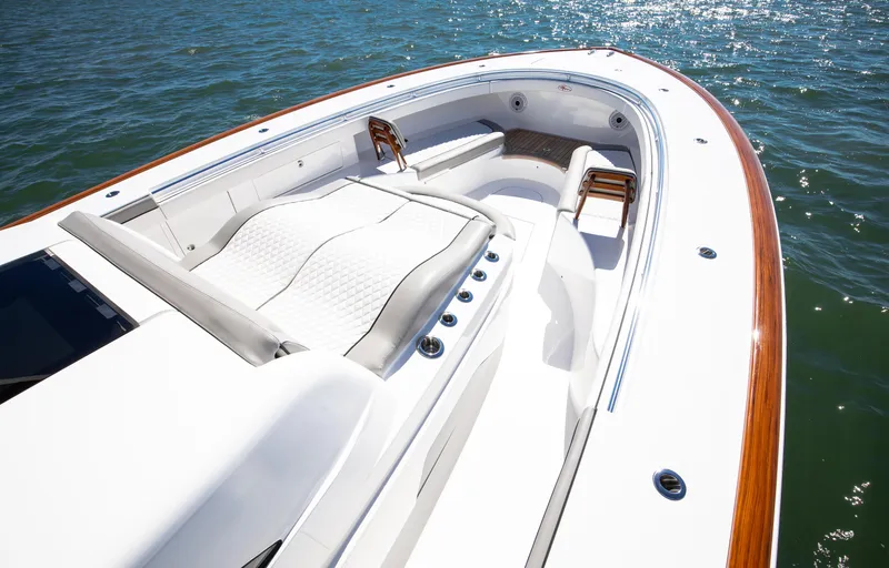 Code Blu Yacht Photos Pics 2022 Valhalla Boatworks 46 Center Console, luxurious seating, sleek design on water.