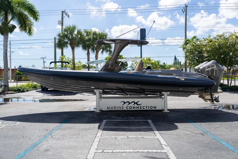 Airship 310 Yacht Photos Pics 2023 Airship 310 boat displayed outdoors at Marine Connection dealership.