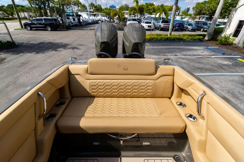 Airship 310 Yacht Photos Pics Luxurious tan seating on 2023 Airship 310 boat with dual outboard motors.