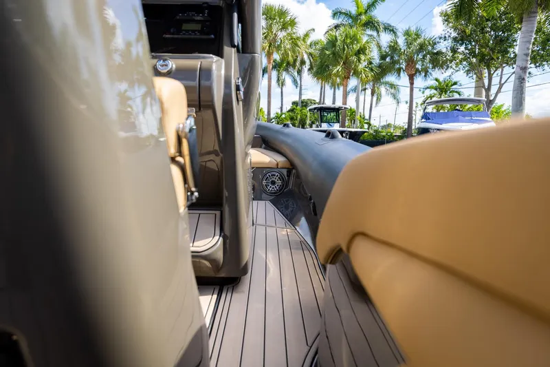 Airship 310 Yacht Photos Pics Interior view of 2023 Airship 310 boat with sleek design and luxurious seating.