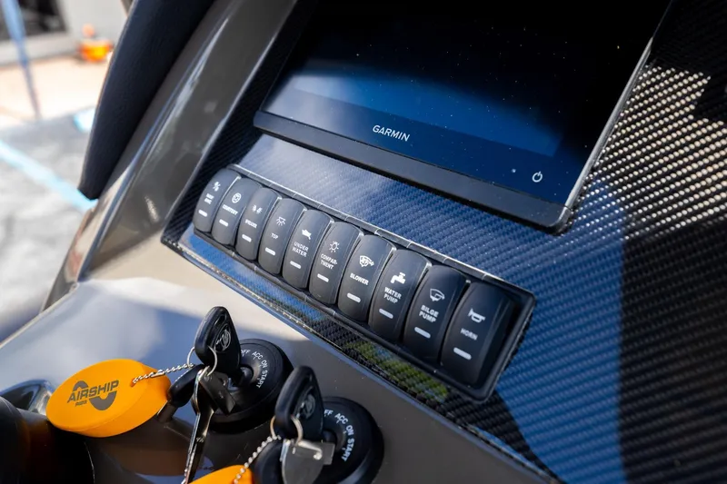 Airship 310 Yacht Photos Pics Control panel of 2023 Airship 310 with Garmin display and key switches.