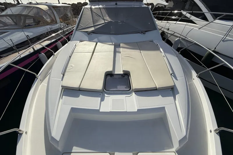  Yacht Photos Pics 2015 Absolute 56 FLY yacht with sunbathing cushions on the deck.