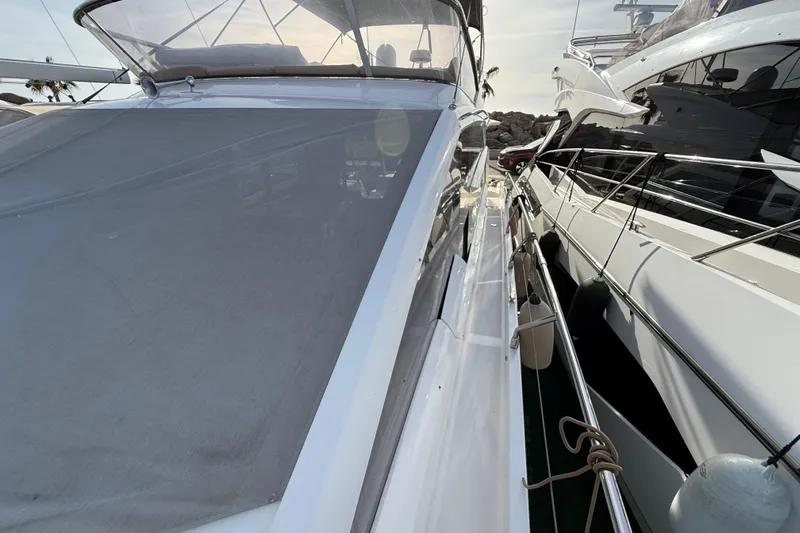  Yacht Photos Pics 2015 Absolute 56 FLY yacht docked, showcasing sleek design and modern features.