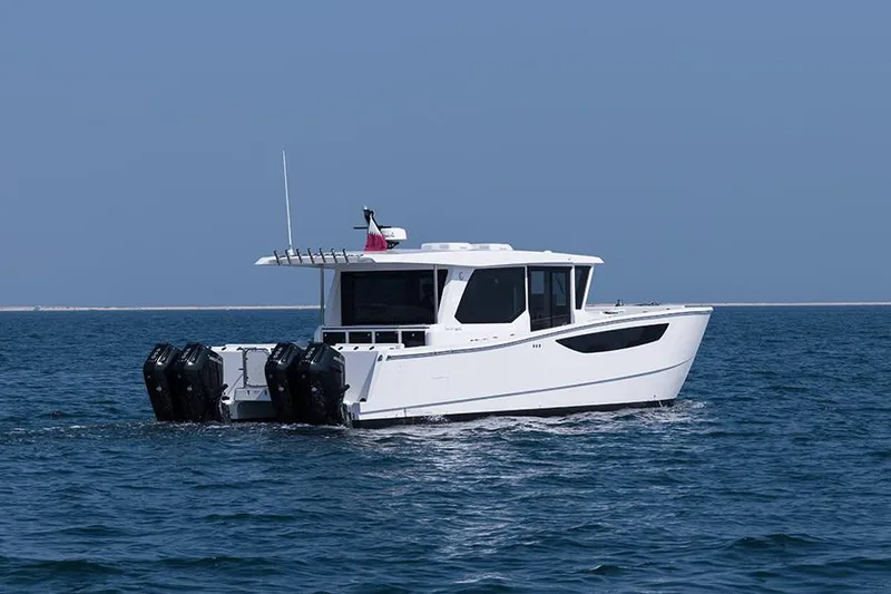  Yacht Photos Pics 2026 SilverCAT 46WA boat cruising on open water, featuring sleek design and multiple engines.