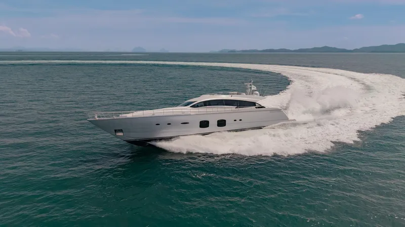 Le Caprice IV Yacht Photos Pics Luxurious 2011 Pershing 108 yacht cruising swiftly on open sea.