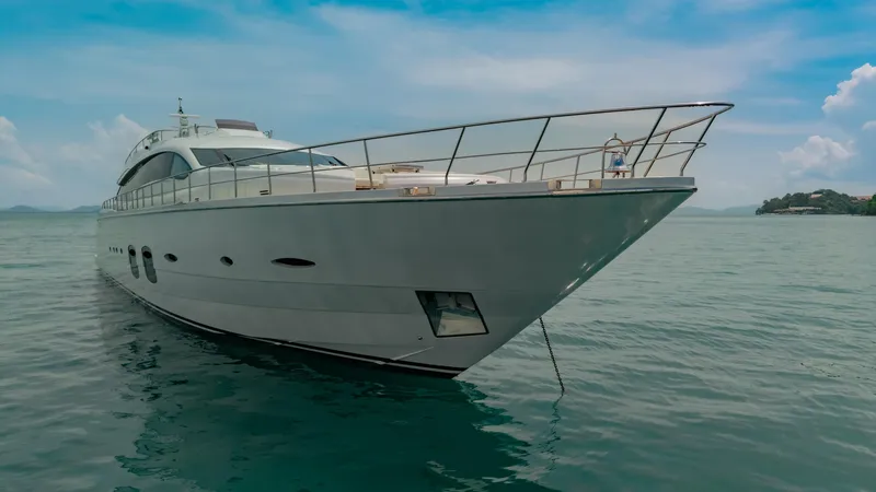 Le Caprice IV Yacht Photos Pics Luxury Pershing 108 yacht from 2011 on calm sea under blue sky.