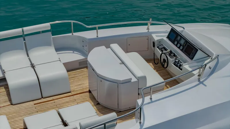 Le Caprice IV Yacht Photos Pics Luxurious 2011 Pershing 108 yacht deck with helm, seating, and ocean view.