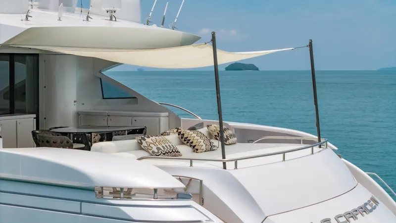 Le Caprice IV Yacht Photos Pics Luxurious 2011 Pershing 108 yacht with elegant deck seating and ocean view.
