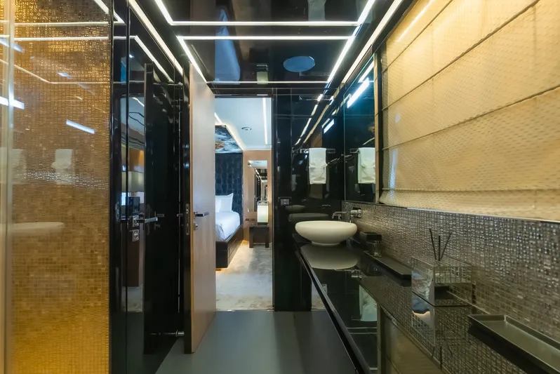 Le Caprice IV Yacht Photos Pics Luxurious bathroom interior on 2011 Pershing 108 yacht, featuring modern design and elegant fixtures.