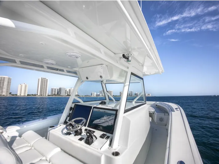  Yacht Photos Pics 2016 Yellowfin 42 boat interior with ocean view and city skyline.