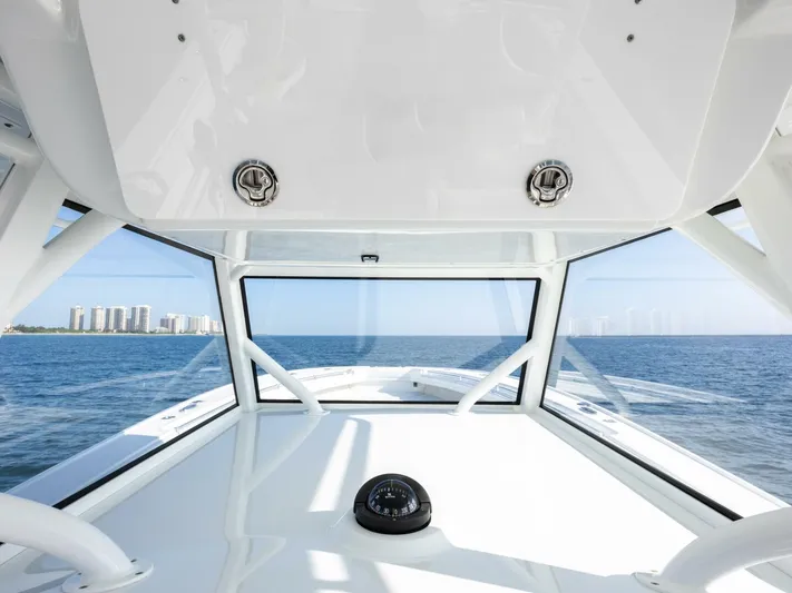  Yacht Photos Pics Interior view of 2016 Yellowfin 42 boat with ocean and city skyline.