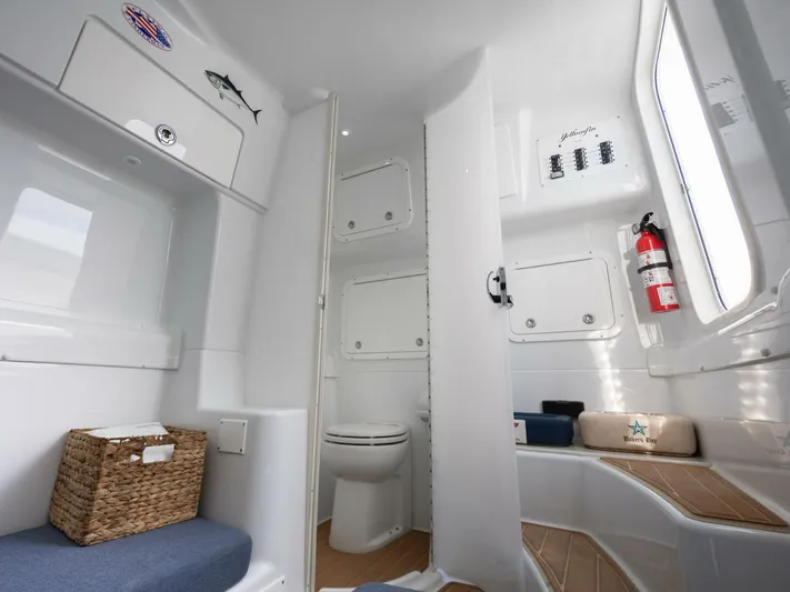  Yacht Photos Pics Interior of 2016 Yellowfin 42 boat with seating, storage, and restroom.
