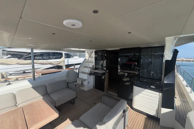  Yacht Photos Pics Luxurious 2023 Absolute 60 Fly yacht interior with spacious seating and modern amenities.