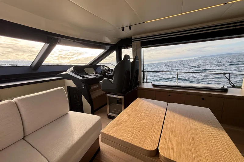 Lizok Yacht Photos Pics Luxurious interior of 2023 Absolute 60 Fly yacht with ocean view.
