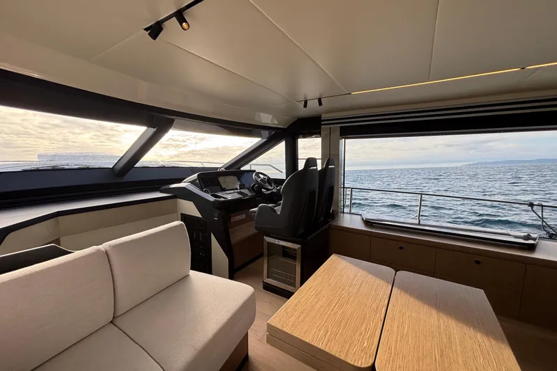 Lizok Yacht Photos Pics Luxurious interior of 2023 Absolute 60 Fly yacht with ocean view.