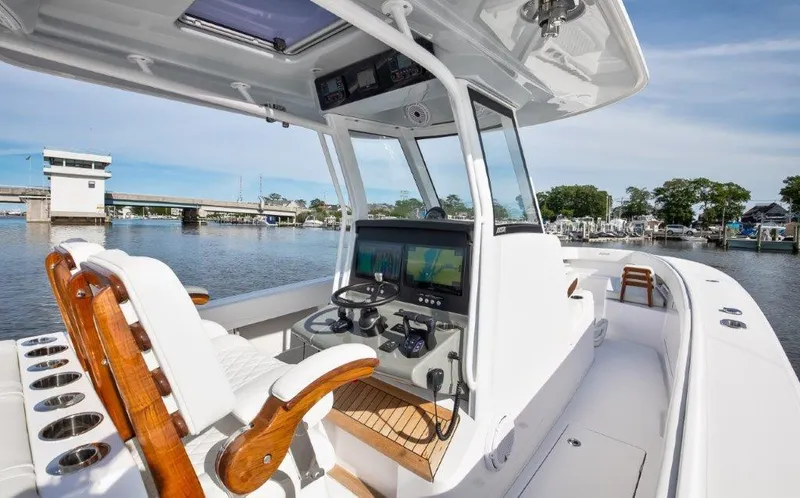  Yacht Photos Pics 2024 Jupiter 340LS boat interior with advanced navigation system and luxurious seating.