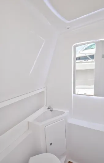  Yacht Photos Pics 2024 Jupiter 340LS boat interior with sleek white bathroom design.