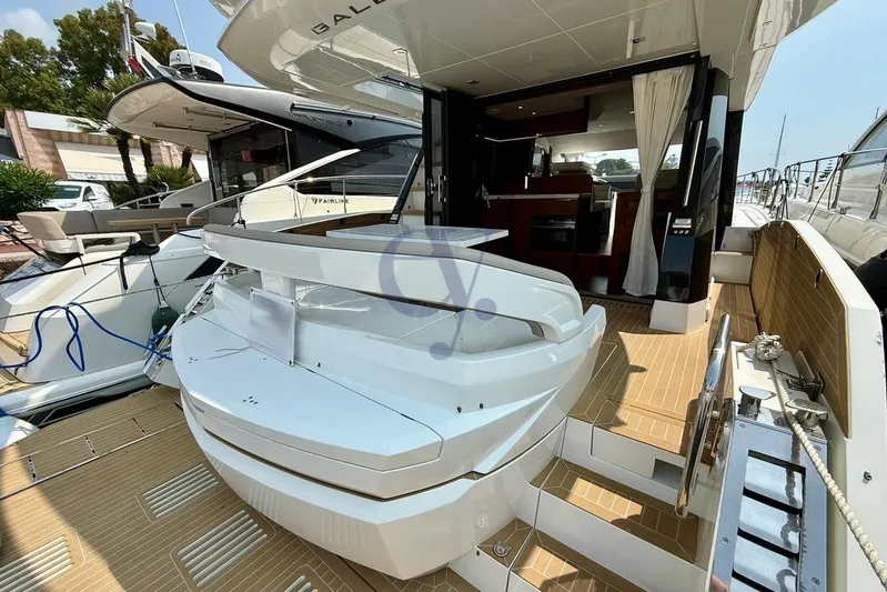  Yacht Photos Pics 2022 Galeon 460 Fly yacht with open deck and luxurious interior view.